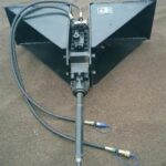 Jack Hammer Attachment for a Track Loader