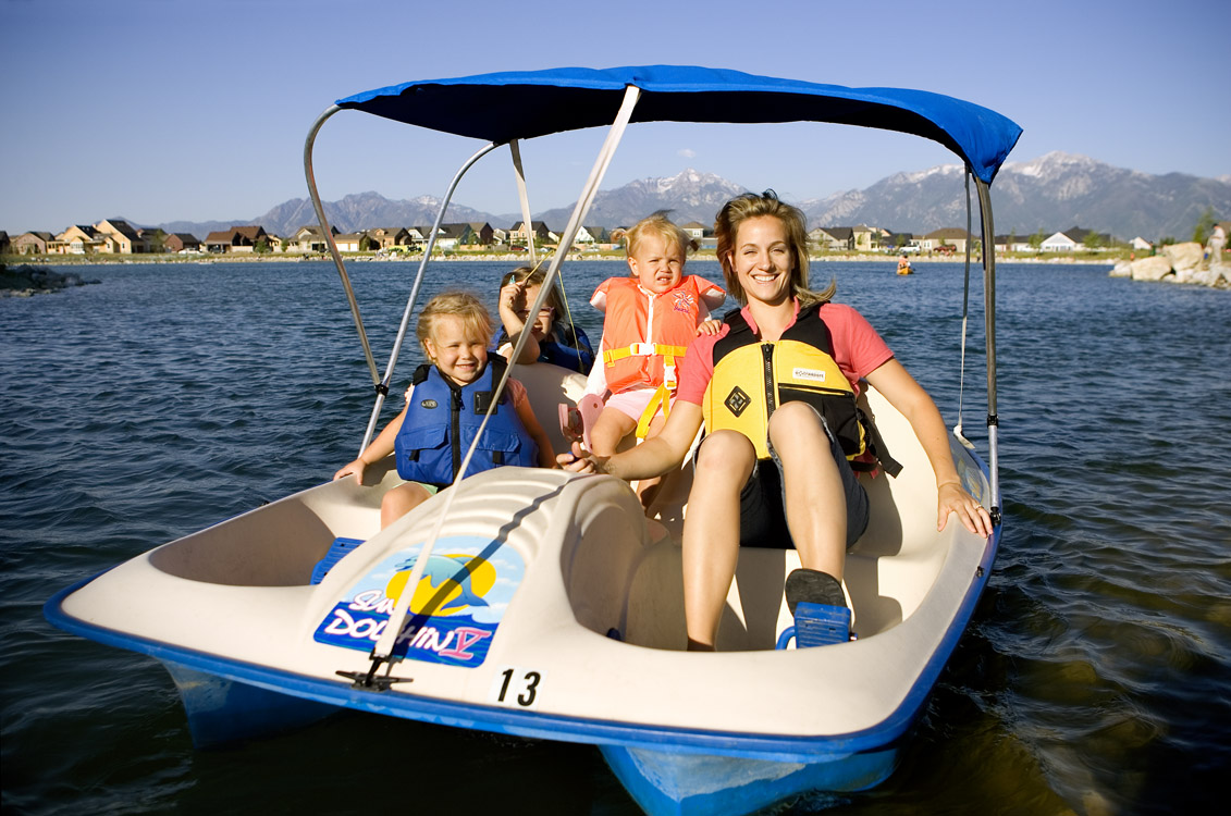 Pedal boat with canopy holds up to 5 people. 